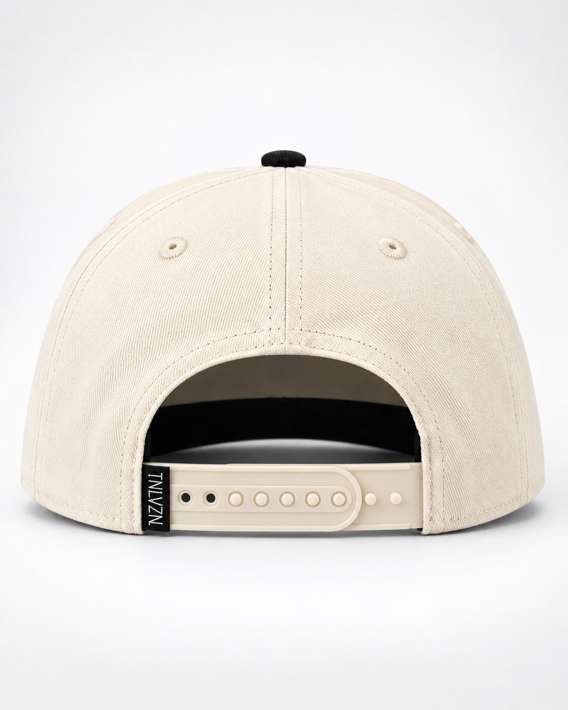 Adjustable beige snapback closure and woven TNLVZN label